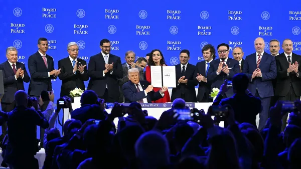 Paraguay's President Santiago Pena (2L), Kazakh President Kassym-Jomart Tokayev (3L), Bahrein's Minister of the Prime Minister's court Sheikh Isa bin Salman bin Hamad al-Khalifa (4L), Pakistan's Prime Minister Shehbaz Sharif (5L), Kosovo's President Vjosa Osmani (C-R), Morocco's Foreign Minister Nasser Bourita (7R), Argentina's President Javier Milei (6R), Mongolia's Prime minister Gombojav Zandanshatar (5R), Armenia's Prime Minister Nikol Pashinyan (4R), Bulgaria's former Prime Minister Rosen Zhelyazkov (3R), Turkey's Foreign Minister Hakan Fidan (2R) and Azerbaijan's President Ilham Aliyev pose with US President Donald Trump (C) holding a signed founding charter at the "Board of Peace" meeting during the World Economic Forum (WEF) annual meeting in Davos on January 22, 2026. US President Donald Trump will show off his new "Board of Peace" at Davos on January 22, 2026 burnishing his claim to be a peacemaker a day after backing off his own threats against Greenland. Originally meant to oversee the rebuilding of Gaza after the war between Hamas and Israel, the board's charter does not limit its role to the Strip, and has sparked concerns that Trump wants it to rival the United Nations.,Image: 1068269690, License: Rights-managed, Restrictions:, Model Release: no, Credit line: Fabrice COFFRINI/AFP/Profimedia