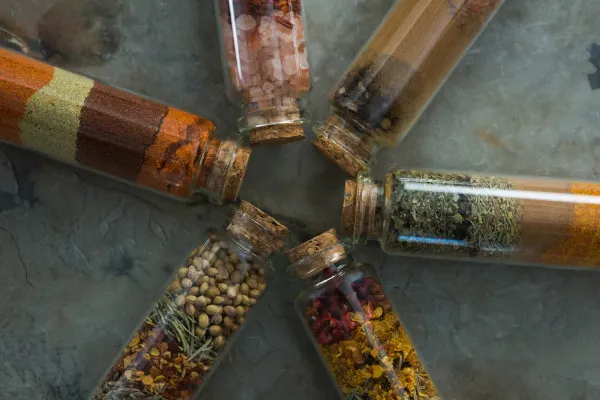 Bottles of various spices on table,Image: 349353197, License: Rights-managed, Restrictions:, Model Release: yes, Credit line: -/Wavebreak/Profimedia