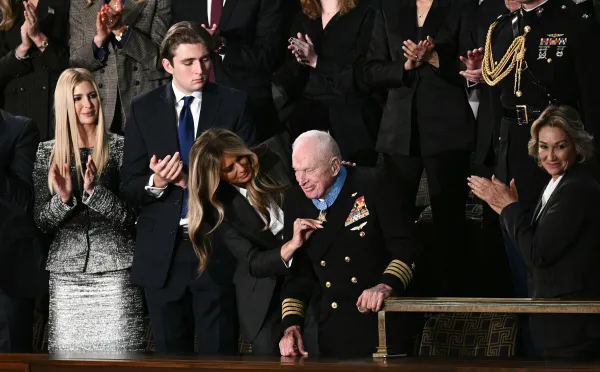 US First Lady Melania Trump presents US veteran Captain E. Royce Williams with the Medal of Honor during US President Donald Trump's the State of the Union address in the House Chamber of the US Capitol in Washington, DC, on February 24, 2026.,Image: 1078055192, License: Rights-managed, Restrictions:, Model Release: no, Credit line: Brendan SMIALOWSKI/AFP/Profimedia