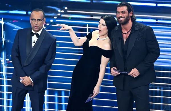 Sanremo, 76th Italian Song Festival. First Night. Pictured: Laura Pausini, Carlo Conti, and Can Yaman.,Image: 1078018439, License: Rights-managed, Restrictions: No Italy., Model Release: no, Credit line: Maurizio D'Avanzo/ipa-agency.net/PA Images/Profimedia