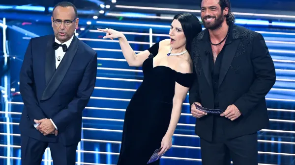 Sanremo, 76th Italian Song Festival. First Night. Pictured: Laura Pausini, Carlo Conti, and Can Yaman.,Image: 1078018439, License: Rights-managed, Restrictions: No Italy., Model Release: no, Credit line: Maurizio D'Avanzo/ipa-agency.net/PA Images/Profimedia