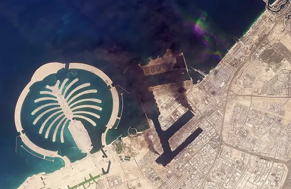 This handout satellite image taken by 2026 Planet Labs PBC on March 2, 2026 shows smoke plumes billowing in Dubai after a projectile strike. Iran's strikes on Gulf neighbours since February 28 -- in response to a joint US-Israeli assault -- forced the UAE to shut its airspace, blindsiding travellers who thought they were headed to one of the region's safest holiday destinations.,Image: 1079590383, License: Rights-managed, Restrictions: RESTRICTED TO EDITORIAL USE - MANDATORY CREDIT "AFP PHOTO/&copy; 2026 PLANET LABS PBC " - HANDOUT - NO MARKETING NO ADVERTISING CAMPAIGNS - DISTRIBUTED AS A SERVICE TO CLIENTS, ***HANDOUT image or SOCIAL MEDIA IMAGE or FILMSTILL for EDITORIAL USE ONLY! * Please note: Fees charged by Profimedia are for the Profimedia's services only, and do not, nor are they intended to, convey to the user any ownership of Copyright or License in the material. Profimedia does not claim any ownership including but not limited to Copyright or License in the attached material. By publishing this material you (the user) expressly agree to indemnify and to hold Profimedia and its directors, shareholders and employees harmless from any loss, claims, damages, demands, expenses (including legal fees), or any causes of action or allegation against Profimedia arising out of or connected in any way with publication of the material. Profimedia does not claim any copyright or license in the attached materials. Any downloading fees charged by Profimedia are for Profimedia's services only. * Handling Fee Only ***, Model Release: no, Credit line: AFP/AFP/Profimedia