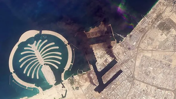 This handout satellite image taken by 2026 Planet Labs PBC on March 2, 2026 shows smoke plumes billowing in Dubai after a projectile strike. Iran's strikes on Gulf neighbours since February 28 -- in response to a joint US-Israeli assault -- forced the UAE to shut its airspace, blindsiding travellers who thought they were headed to one of the region's safest holiday destinations.,Image: 1079590383, License: Rights-managed, Restrictions: RESTRICTED TO EDITORIAL USE - MANDATORY CREDIT "AFP PHOTO/&copy; 2026 PLANET LABS PBC " - HANDOUT - NO MARKETING NO ADVERTISING CAMPAIGNS - DISTRIBUTED AS A SERVICE TO CLIENTS, ***HANDOUT image or SOCIAL MEDIA IMAGE or FILMSTILL for EDITORIAL USE ONLY! * Please note: Fees charged by Profimedia are for the Profimedia's services only, and do not, nor are they intended to, convey to the user any ownership of Copyright or License in the material. Profimedia does not claim any ownership including but not limited to Copyright or License in the attached material. By publishing this material you (the user) expressly agree to indemnify and to hold Profimedia and its directors, shareholders and employees harmless from any loss, claims, damages, demands, expenses (including legal fees), or any causes of action or allegation against Profimedia arising out of or connected in any way with publication of the material. Profimedia does not claim any copyright or license in the attached materials. Any downloading fees charged by Profimedia are for Profimedia's services only. * Handling Fee Only ***, Model Release: no, Credit line: AFP/AFP/Profimedia
