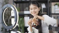 Beauty blogger Young Asian girl makeup artist Professional Woman blogger vlogger is showing cosmetics products with recording video Beauty influencer asian girl video online marketing live streaming,Image: 1022373389, License: Royalty-free, Restrictions:, Model Release: yes, Credit line: Sirijit Jongcharoenkulchai/imageBROKER/Profimedia